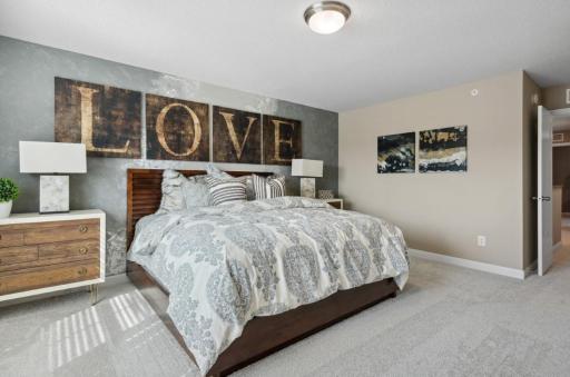 (Photo of decorated model, actual home's finishes will vary) Find your retreat in this stunning owner's suite. Enjoy the exclusivity of a private bath and huge walk-in closet.