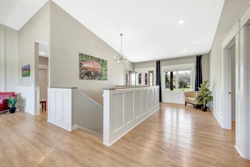 The front foyer is open, flowing and flooded with natural light. Custom wide trim work around each window and door. Each door throughout the home is 3'0 to allow for easy mobility and access throughout.
