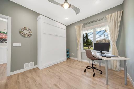 2nd Bedroom on the main level features built-in Murphy bed or can also be used as a convenient home office.