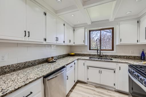 Kitchen offers granite countertops and ss appliances.