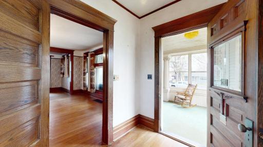 You'll love all of the natural woodwork in the front entry leading into the rand living room.jpg
