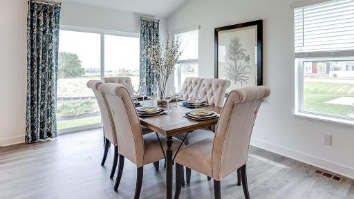 Good sized dining area for many to gather and enjoy. Photo of Model Home. Options and colors may vary. Ask Sales Agent for details.