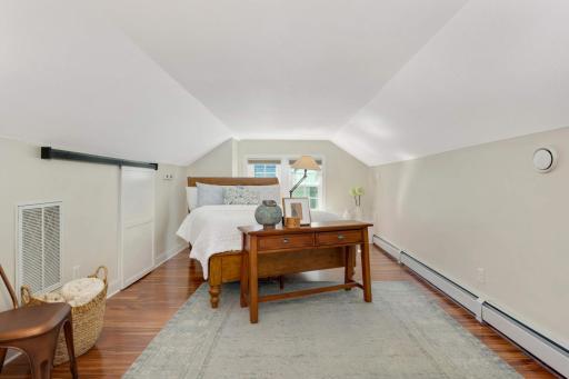 Upstairs can be used as a spacious bedroom or a beautiful, sunny office. So much light & airy space to enjoy!