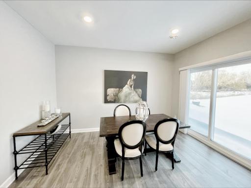 Photo of similar home, colors and finishes will vary. The dinette is nicely sized and is seamlessly connected to the kitchen and family room.