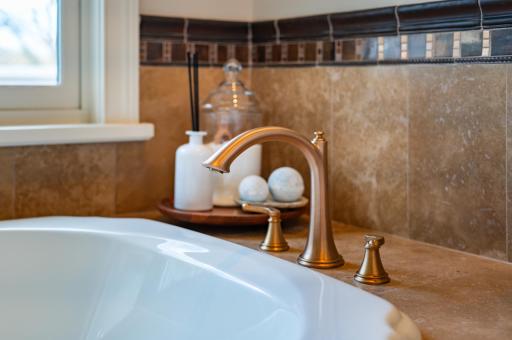 Brushed Brass Faucets in Primary Bath