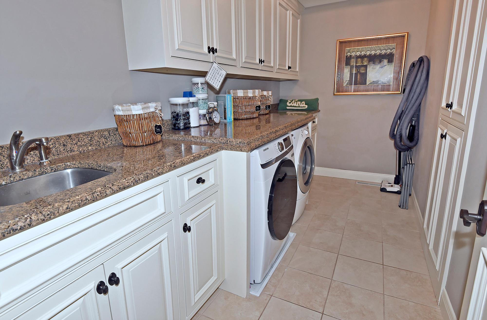 Upper Level Laundry Room has Filtered Water Tap and Central Vacuum