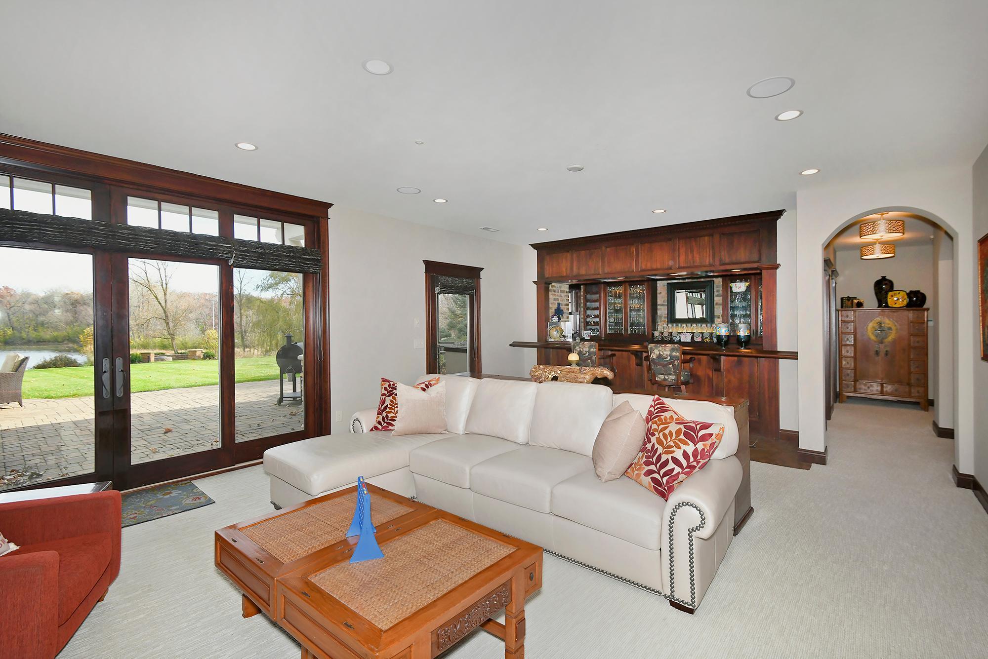 Family Room View to Bar & Screen Porch