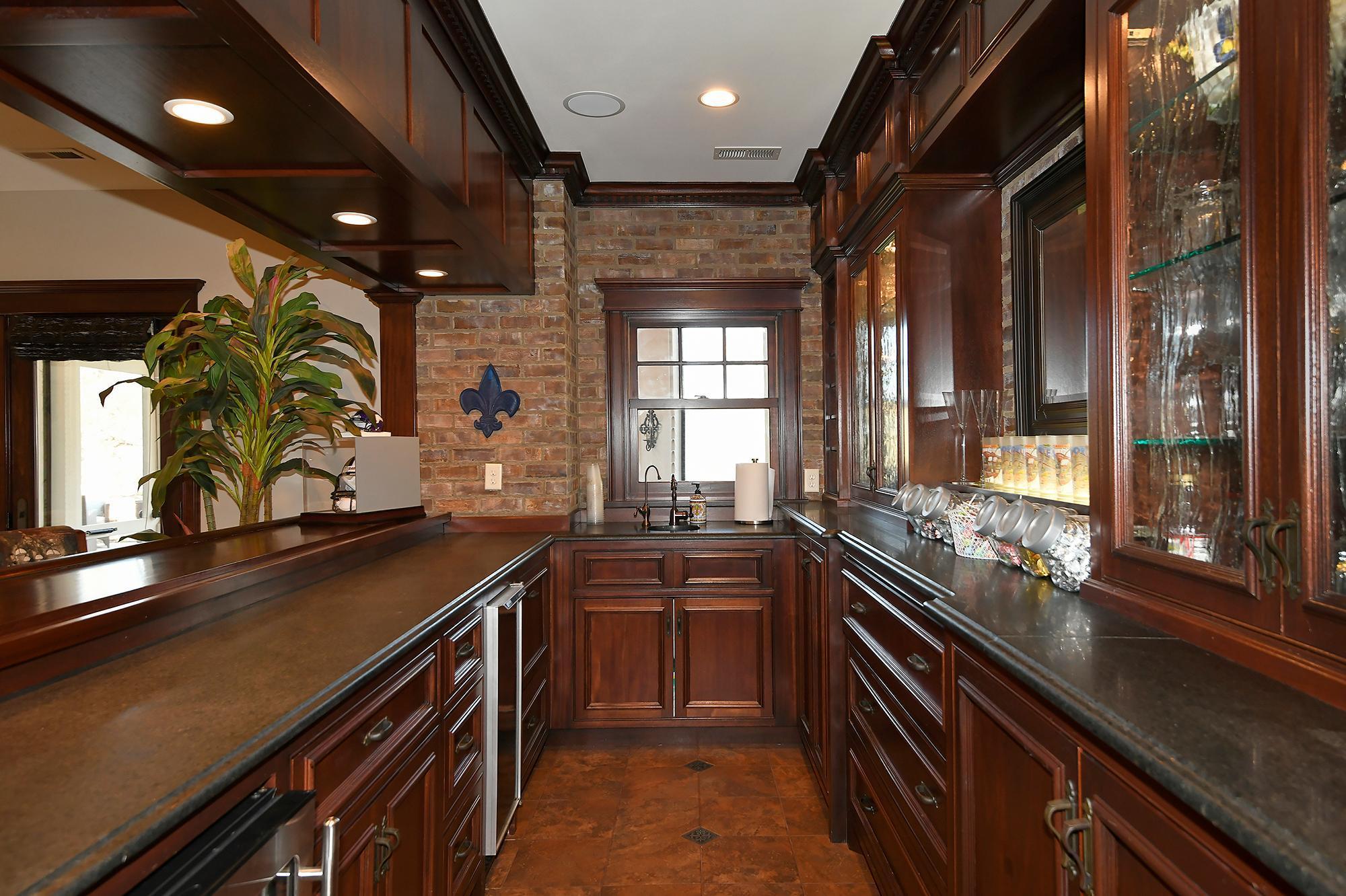 Bar Interior Includes Wine Fridge, Dishwasher Drawer, Ice Maker, Hammered Copper Sink & Filtered Water Tap