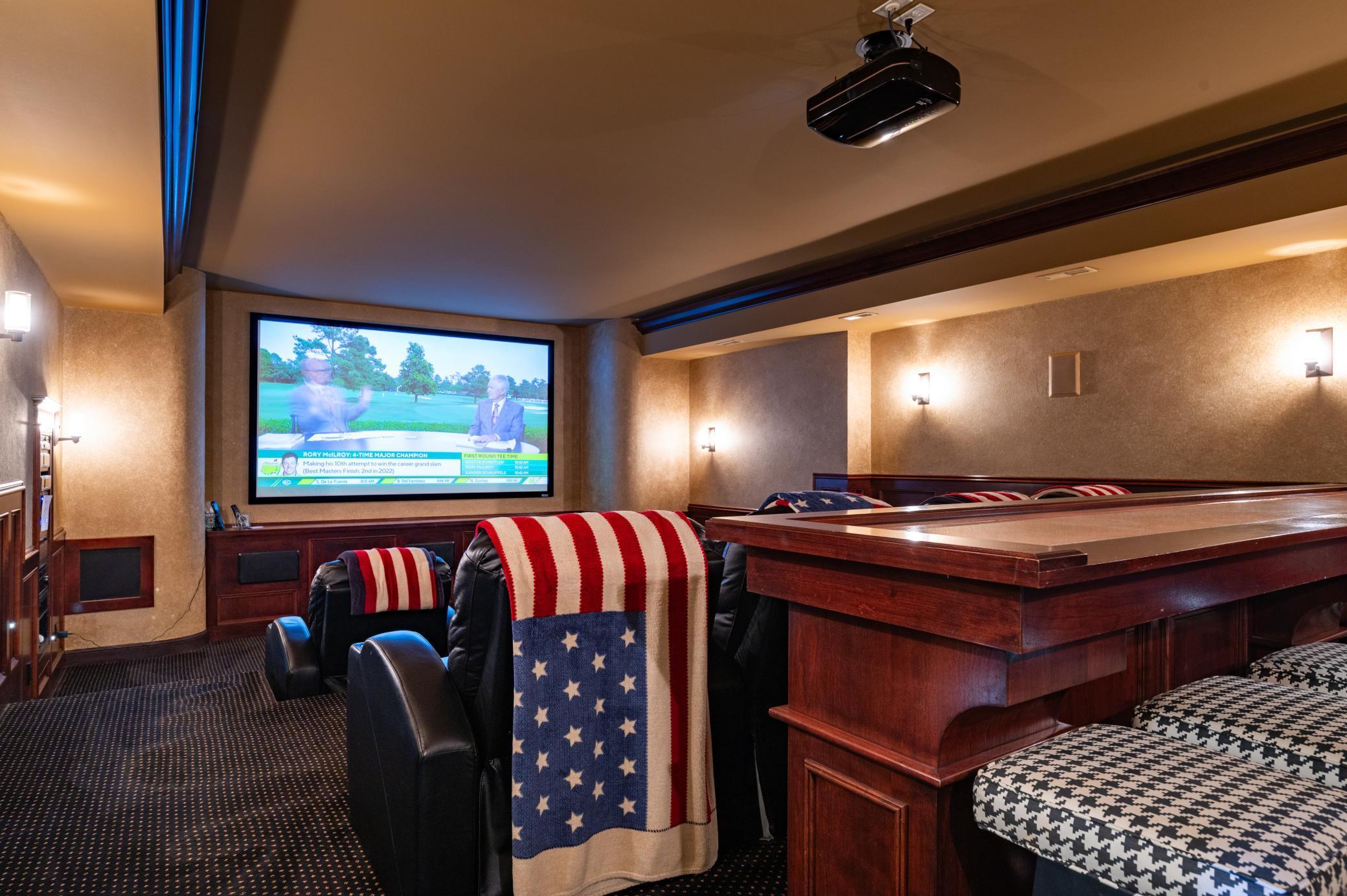 Elegant Home Theater with Recliner Seating for 8 and Bar Seating for 6!