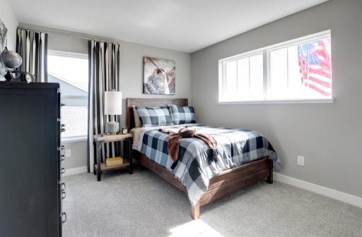 The other upstairs bedrooms provide plenty of space for a full size bed, night stands, and dressers! *photo of model with same floor plan. Selections will differ.