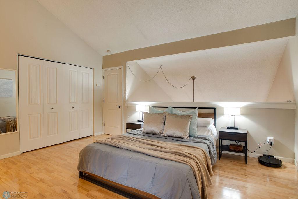 loft bedroom has 3 closets!