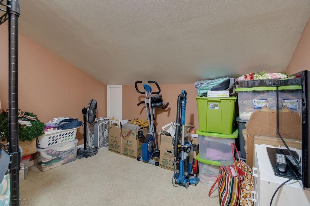 large walk in closet in loft bedrom