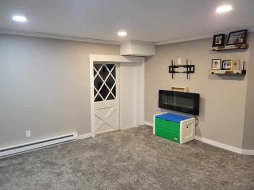 Lower level family room with entrance to garage!