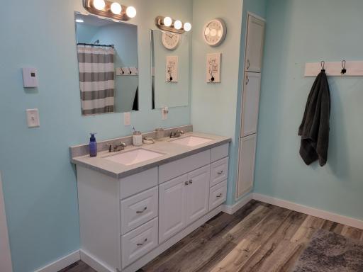 Double vanity and large built-in storage cabinet!