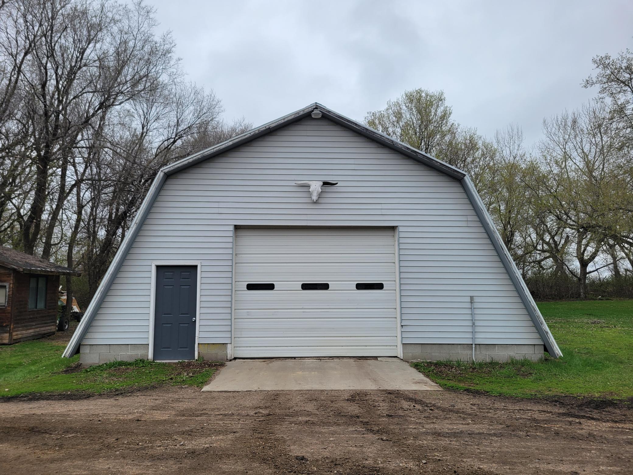 Barn door is 10 feet high, 12 feet wide.