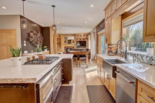 Never lose track of your company or conversations with this open floor plan and working triangle in your kitchen.