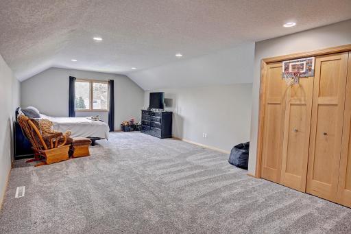 4th upper level bedroom can flex as a large bedroom or a grand bonus room for extra gaming or hobby space!