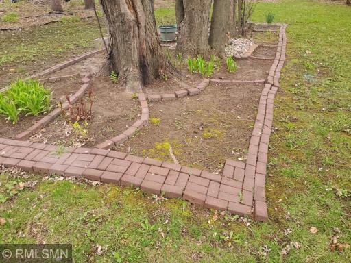 Lots of yard possibilities with existing perrnials.