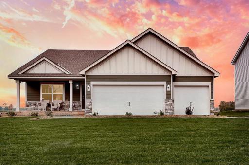 Welcome home to the Cameron II Heartland Cottage at Ravine Crossing in Cottage Grove! Photo is of Model home. Options and colors may vary. Ask Sales Agent for details.