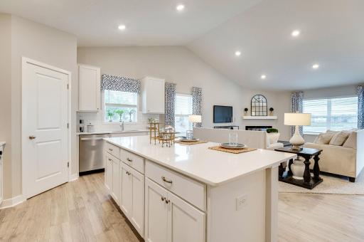 Vaulted ceilings and an open-concept design make this home stand out! Photo of Model Home. Options and colors may vary. Ask Sales Agent for details.