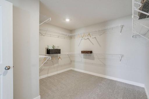 Extremely large walk in closet. *PICTURES OF PREVIOUS MODEL HOME, SELECTIONS AND FINISHES TO VARY.