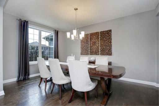 Host the holidays in your spacious dining room. Easily expands to allow for small and large group entertaining. Overlooks the beautiful front yard and has great western exposure in the afternoon/evening.
