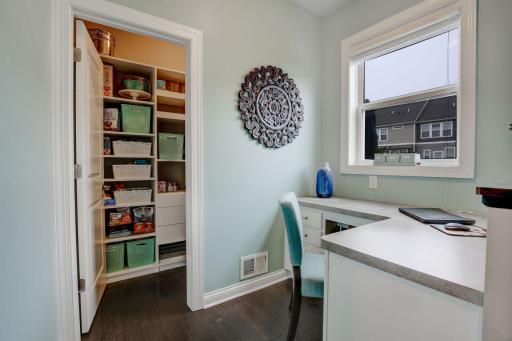 The command center is the perfect place to store extra school papers, the bills and get work done. Large walk-in pantry has great shelving and storage.