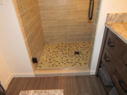 Main floor 3/4 bath All ceramic & pebble floor in shower