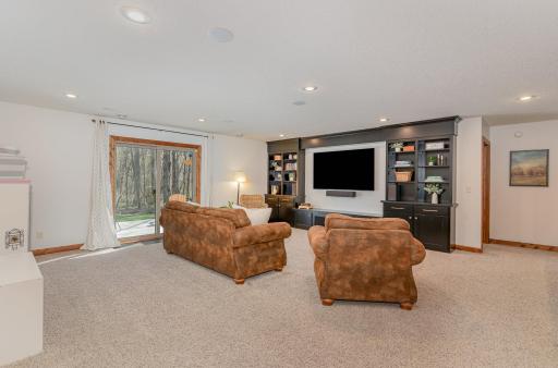 Across from the wet bar is the family room that walks out to a patio.