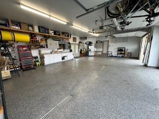 40 x 26 heated garage w/polyurethane floor!
