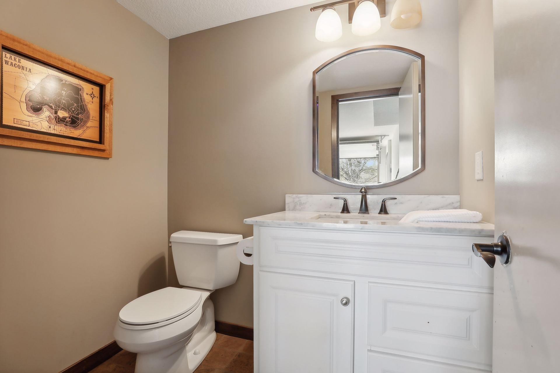 Convenient 1/2 bathroom in the outbuilding.