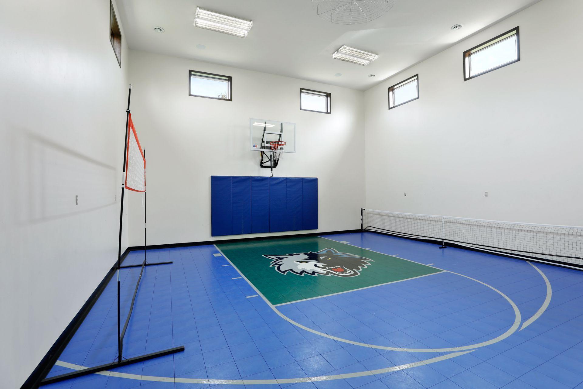 How about this fabulous sport court in the custom outbuilding!? Currently setup for a Minnesota Sports Fan but this very versatile space for ready for burning some calories and absolute FUN! Bring on some basketball, pickleball, volleyball & more!!