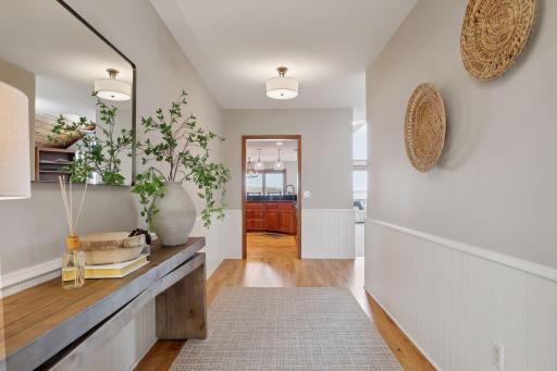 This fabulous, spacious foyer welcomes you and your guests with its beautiful hardwood flooring, neutral paint colors.