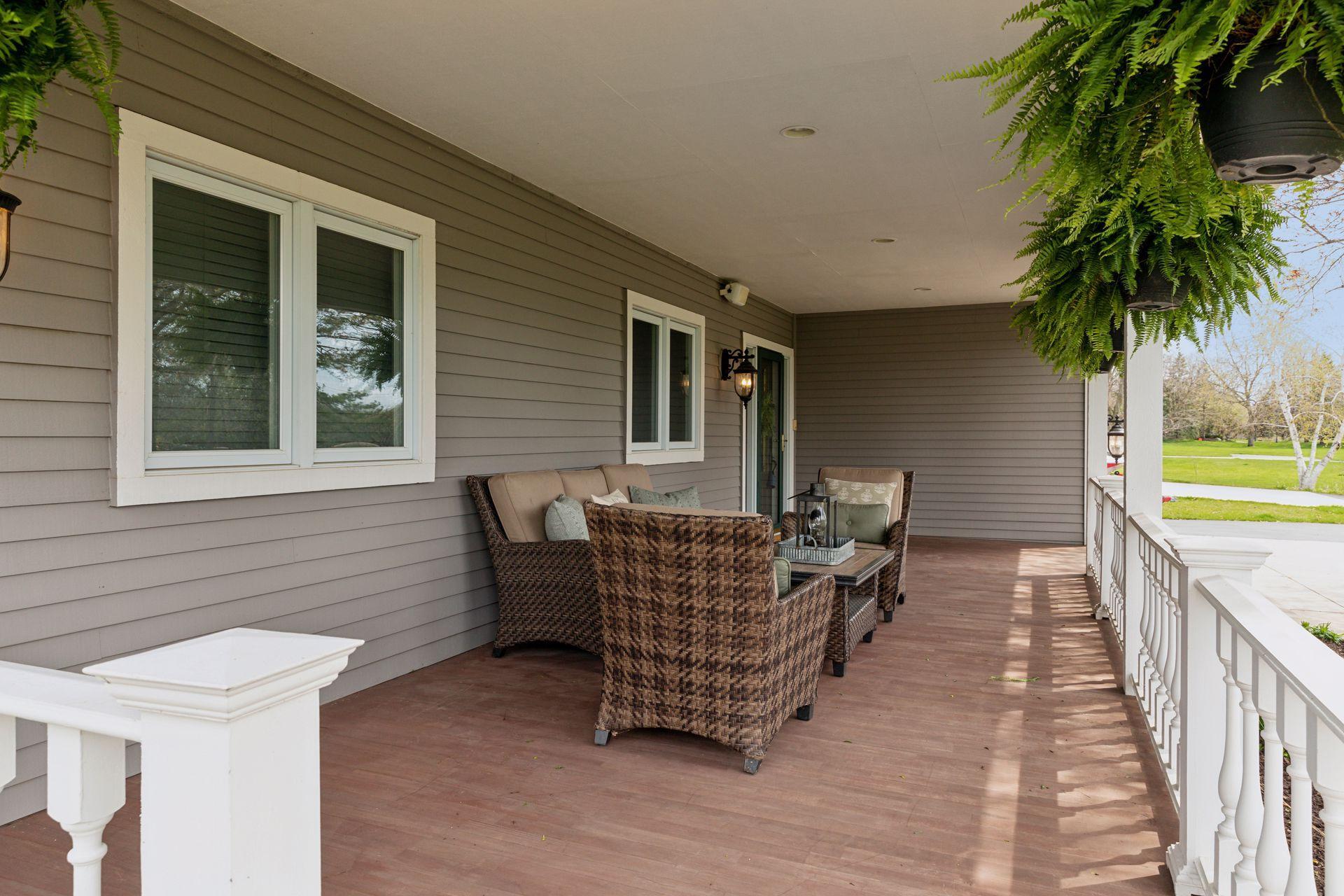 Welcome to this charming, large front porch! Great outdoor spaces in the front AND the back of this fabulous home.