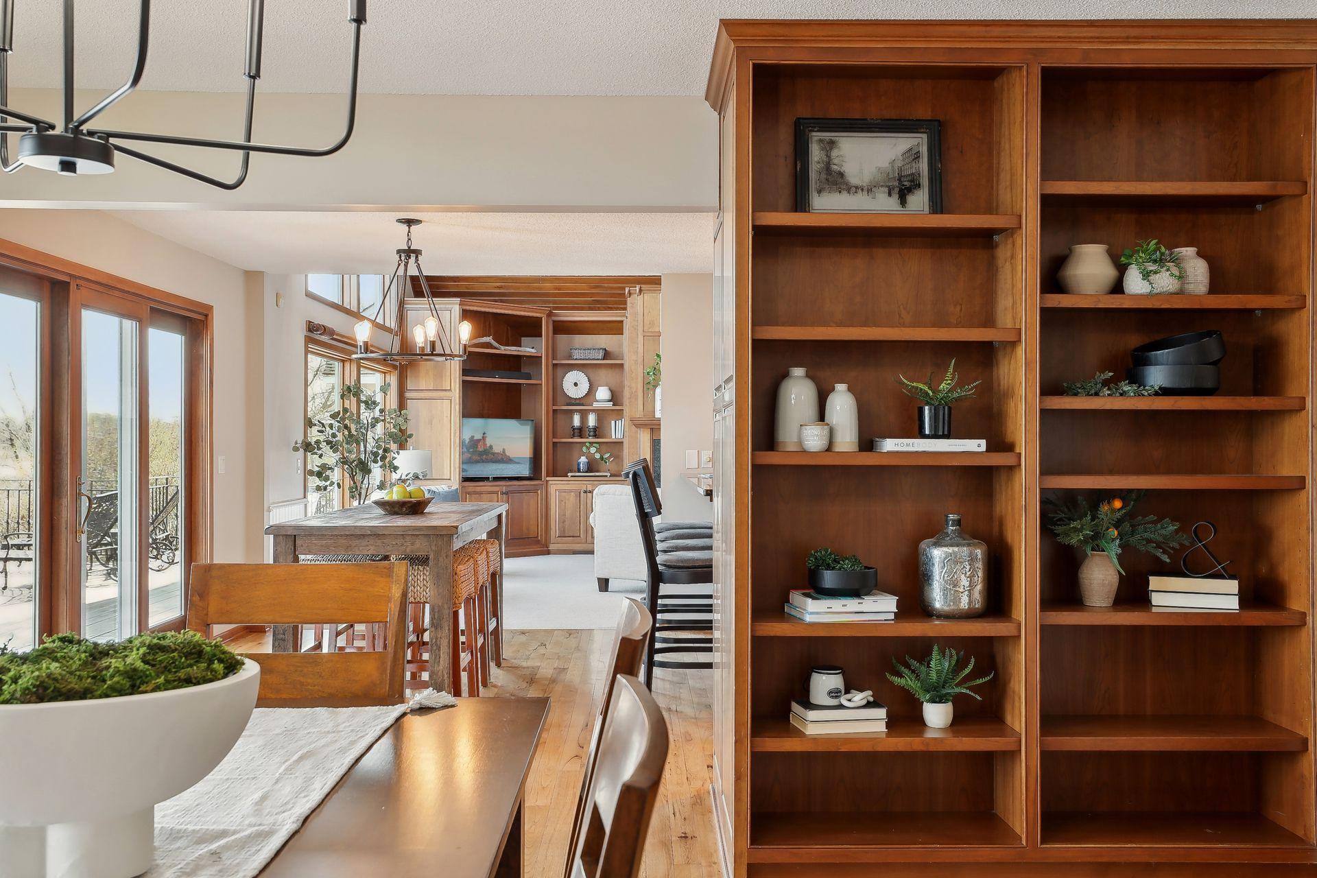 Custom cherry cabinetry and wonderful shelves throughout!
