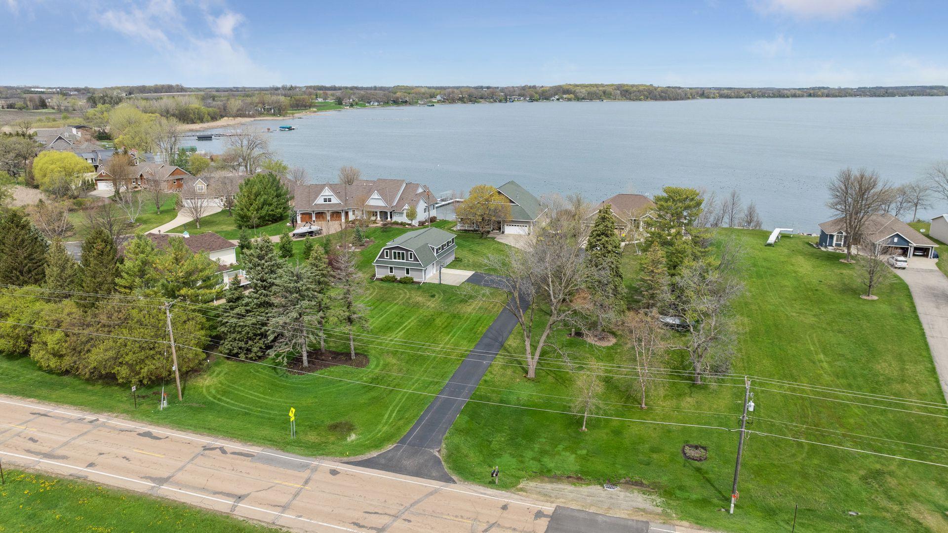 1 acre, sprawling lot! 97 feet of lakeshore. This is a one of a kind property on highly sought after, Lake Waconia!