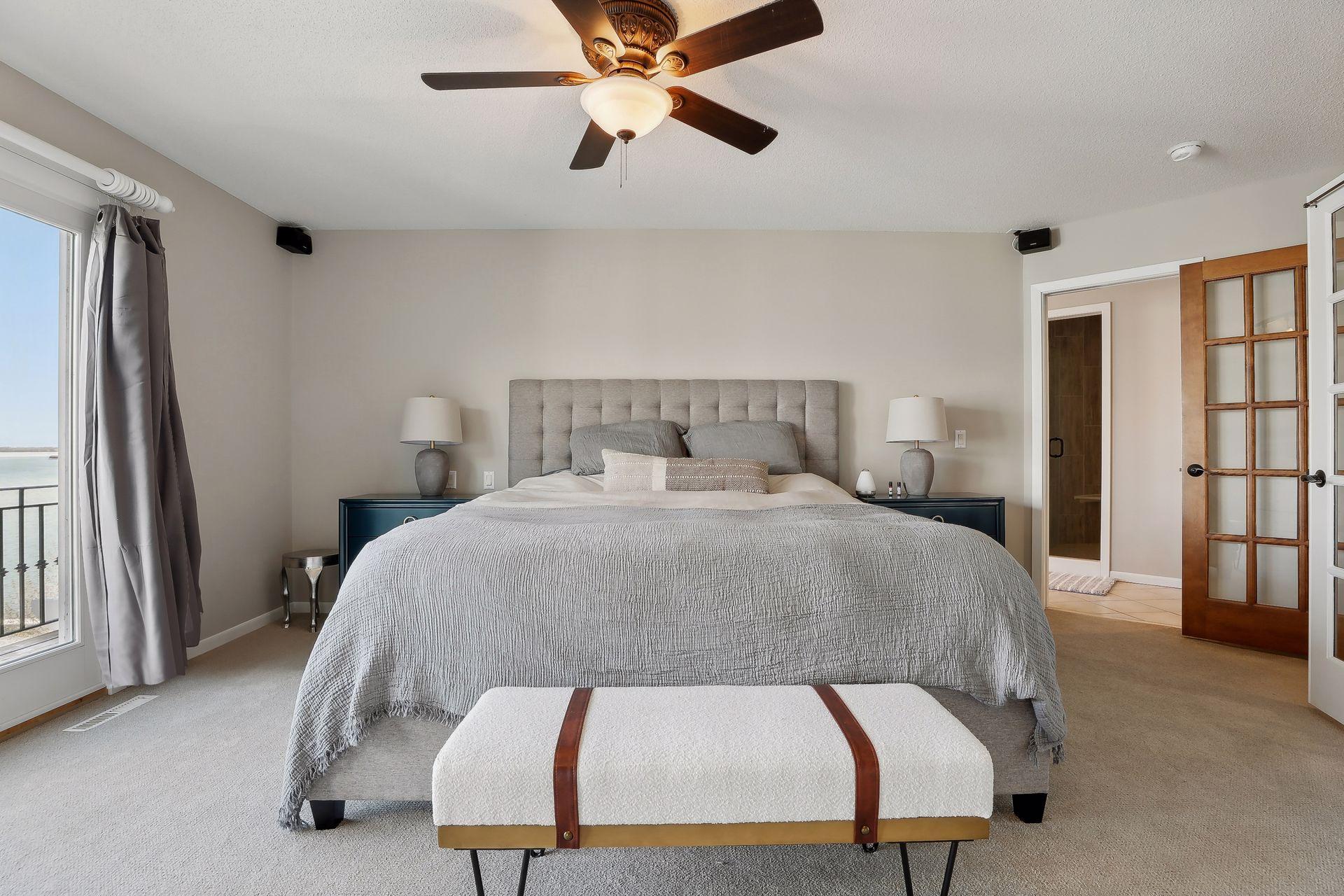 Fabulous Owners Suite w/ updated carpeting, neutral pallete and fabulous built-in drawers and shelving.