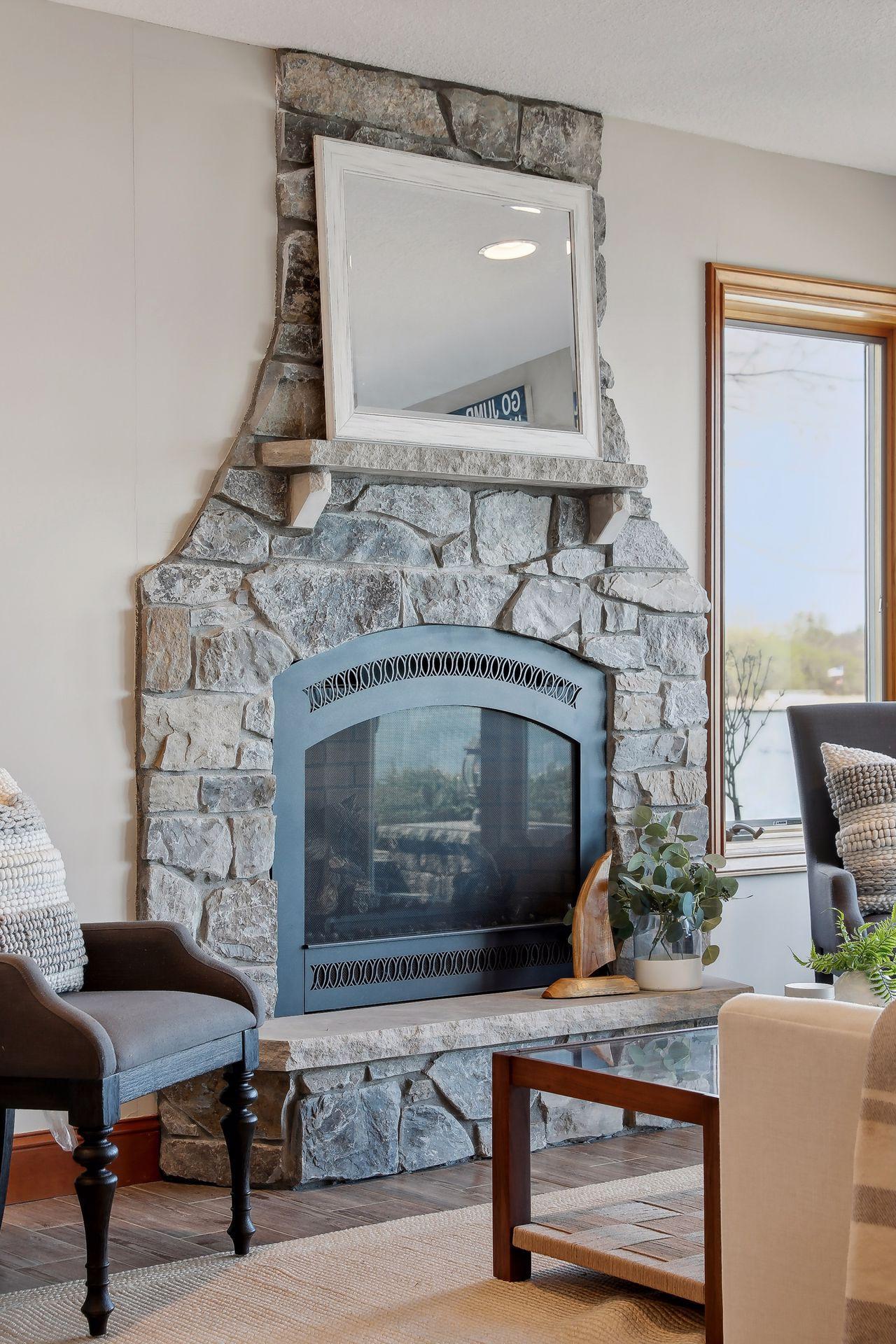 Cozy up by this beautiful stone fireplace.