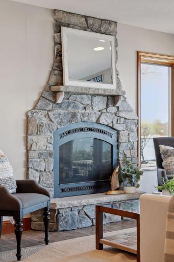 Cozy up by this beautiful stone fireplace.
