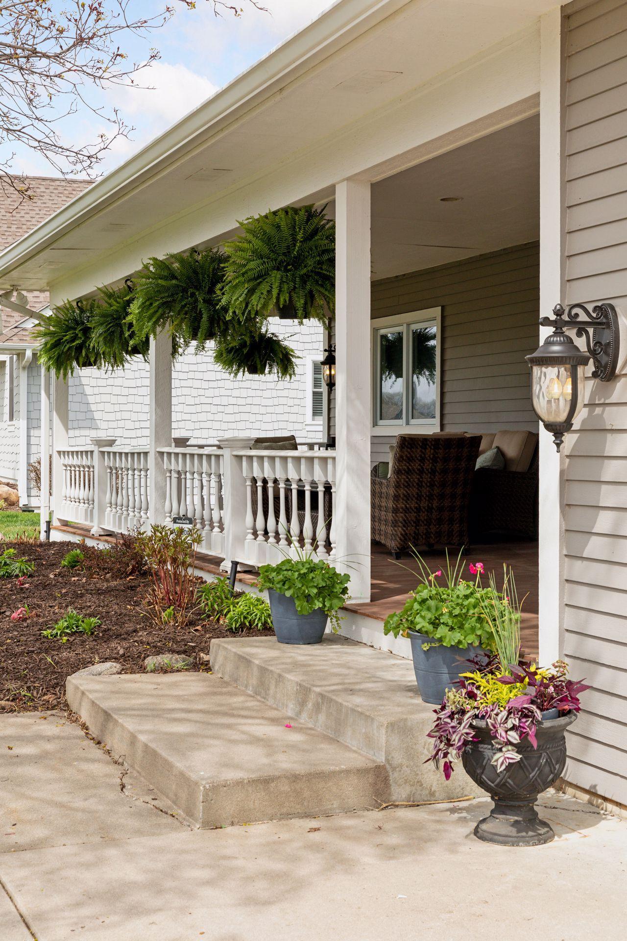 Welcome to this charming, large front porch!