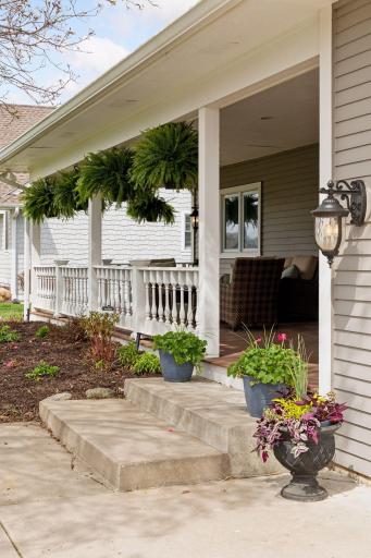Welcome to this charming, large front porch!