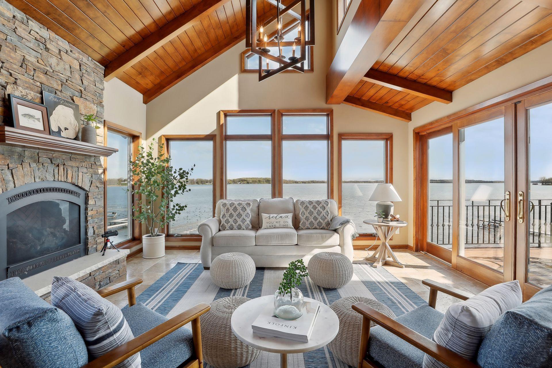 This dreamy spot could be yours! Windows galore and spectacular lake views!