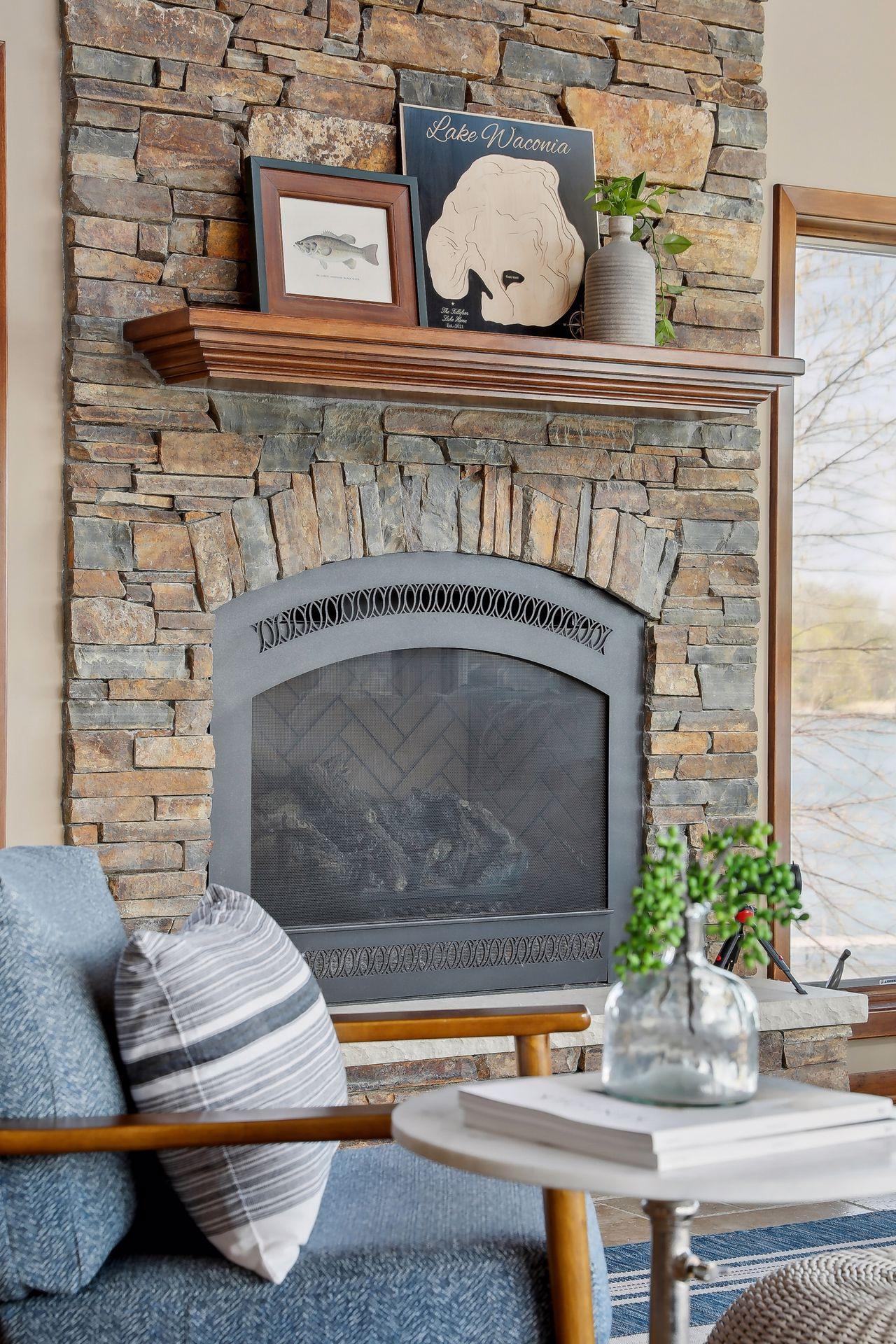3 fireplaces throughout accented by beautiful stone!