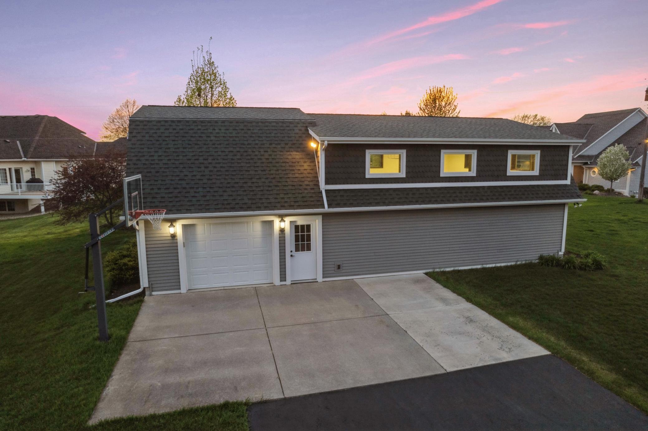 Lots of extra parking for lake guests. 3rd car garage stall, 1/2 bathroom.