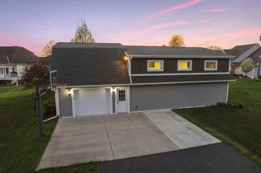 Lots of extra parking for lake guests. 3rd car garage stall, 1/2 bathroom.