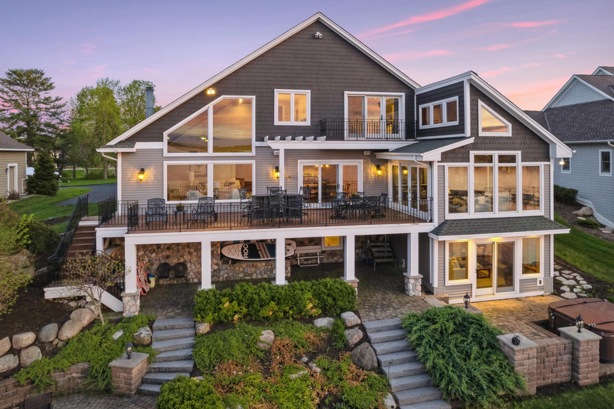 Dreamy breathtaking lake views from the entire back side of this wonderful lakehome.
