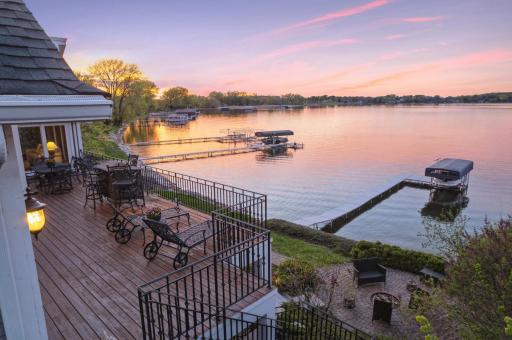 This north facing home doesn't miss out on those beautiful sunsets! Sunsets to the West, sunrises to the East. Both beautifully captured in this fabulous lake reflections. Serene views all day long!