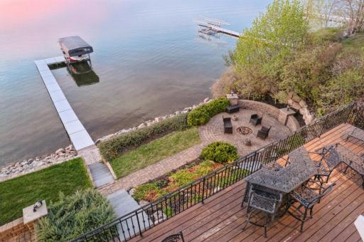 Private firepit area, paver patio and walkway. Beautifully landscaped.