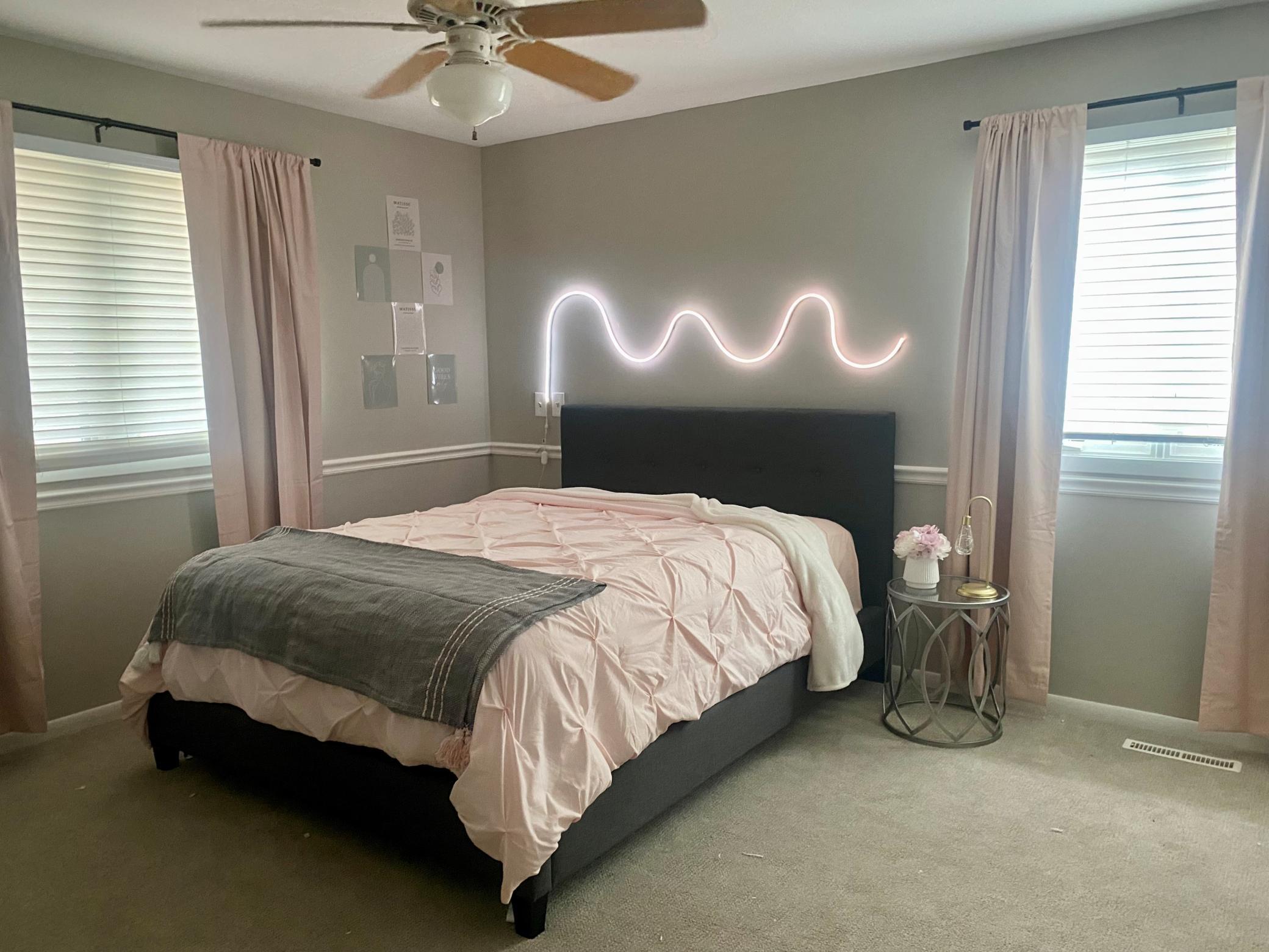 Two spacious bedrooms on the main level. Double windows in this 3rd bedroom bring in a ton of natural light. Custom blinds, double closet. Updated, neutral carpeting.