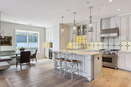 Grab a quick bite at the large center island or in the inviting breakfast nook